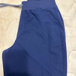Navy Blue FIGS jogger scrub pants.